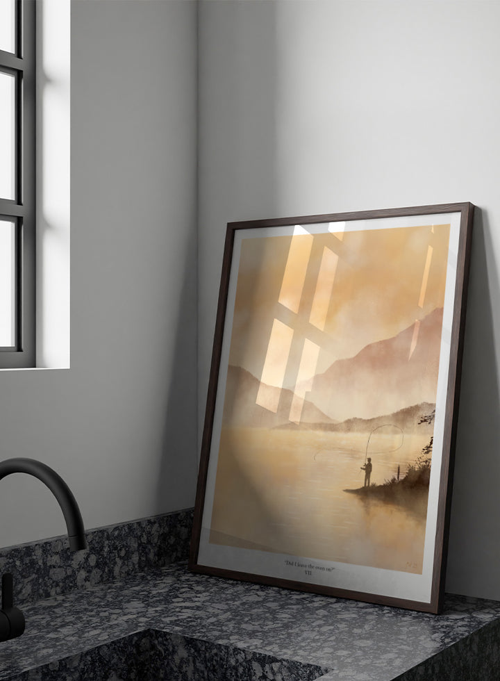 A framed art print featuring a serene landscape painting of a fisherman casting a line on a misty lake with mountains in the background, rendered in warm golden and beige tones. Shop Misty Lake Fisherman by Jake Waldron, a minimalist fishing wall art print featuring a lone angler, mountain lake, golden mist, and outdoor adventure.