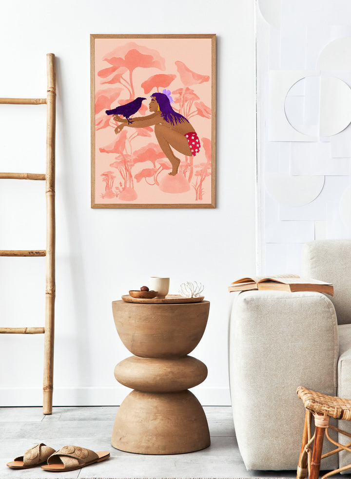 Illustration of a woman with a bird on a pink floral background. Raven by Jota de Jai is a modern pink wall art print of a woman with a purple raven, available as a premium fine art poster with optional wood framing.