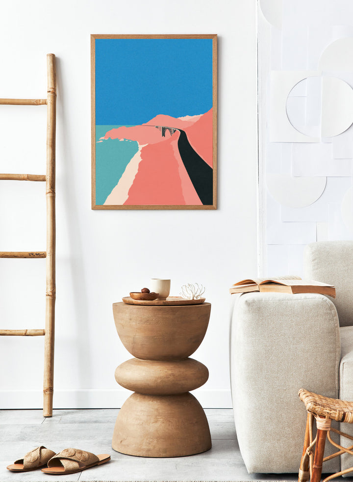 Artistic illustration of a coastal road with cliffs and blue sky. Pacific Coast Highway Big Sur by Rosi Feist is a modern minimalist landscape art print with bold color and Bauhaus-inspired graphic design. Officially licensed fine art poster with framing.