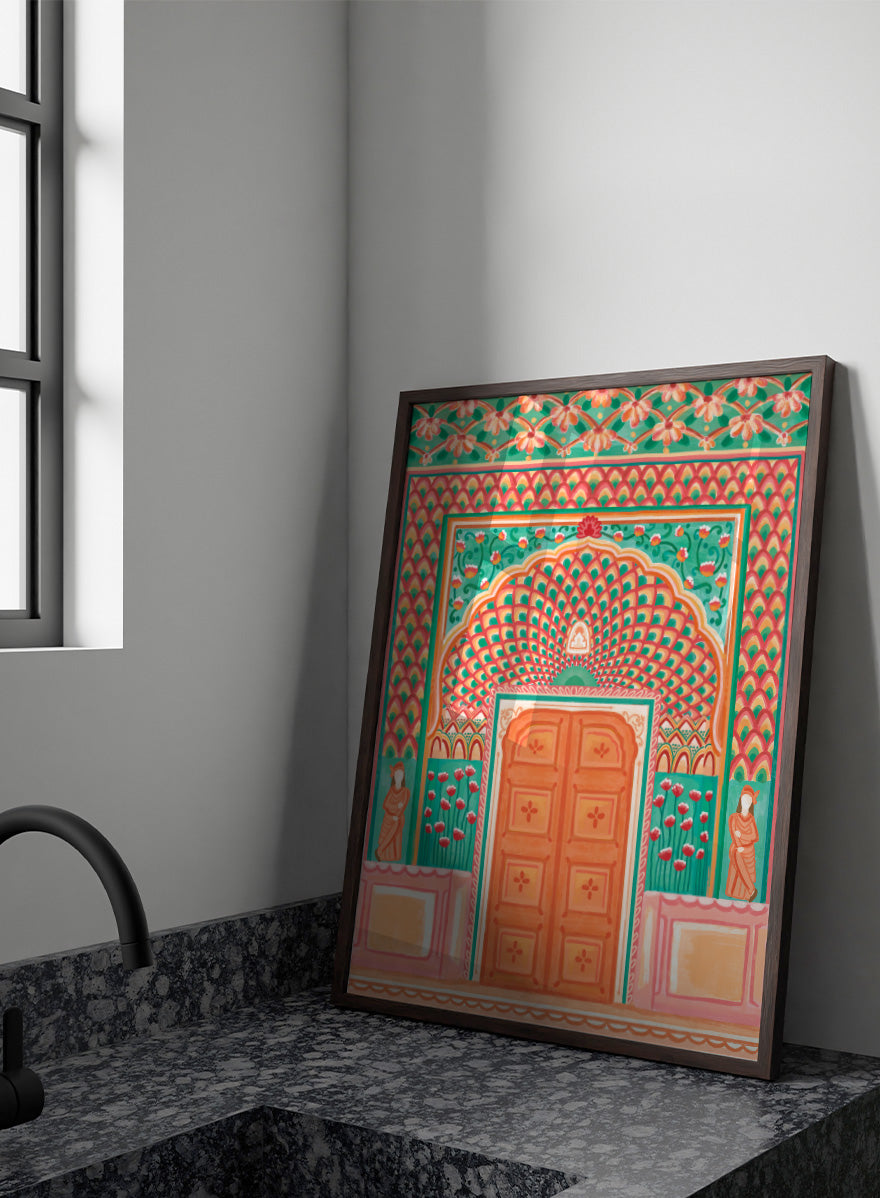 A colorful traditional Indian-style architectural artwork depicting an ornate arched doorway with a peach-orange double door, teal and pink patterned walls, floral motifs, and small statue figures on either side. Shop Vibrant Indian Archway by Nidhi Kachhadiya, a colorful Indian wall art print featuring an ornate archway, floral details, and coral pink tones.