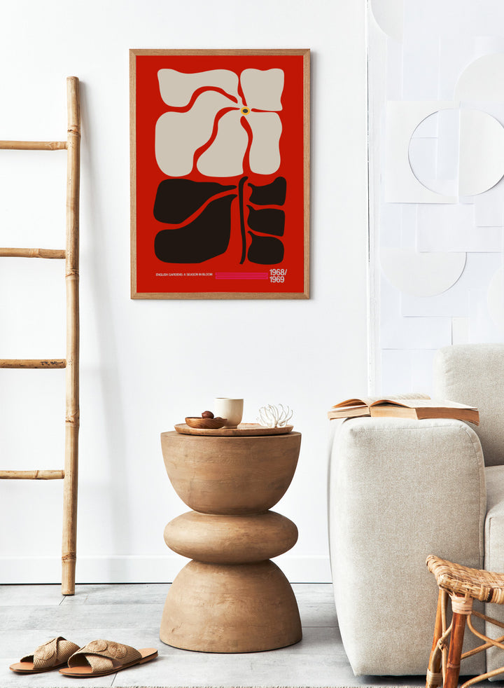 Abstract design with geometric shapes on a red background, featuring text at the bottom. English Gardens Red by Frances Collett features a bold illustrated flower with dark leaves on a red background. Officially licensed floral wall art print with optional framing.