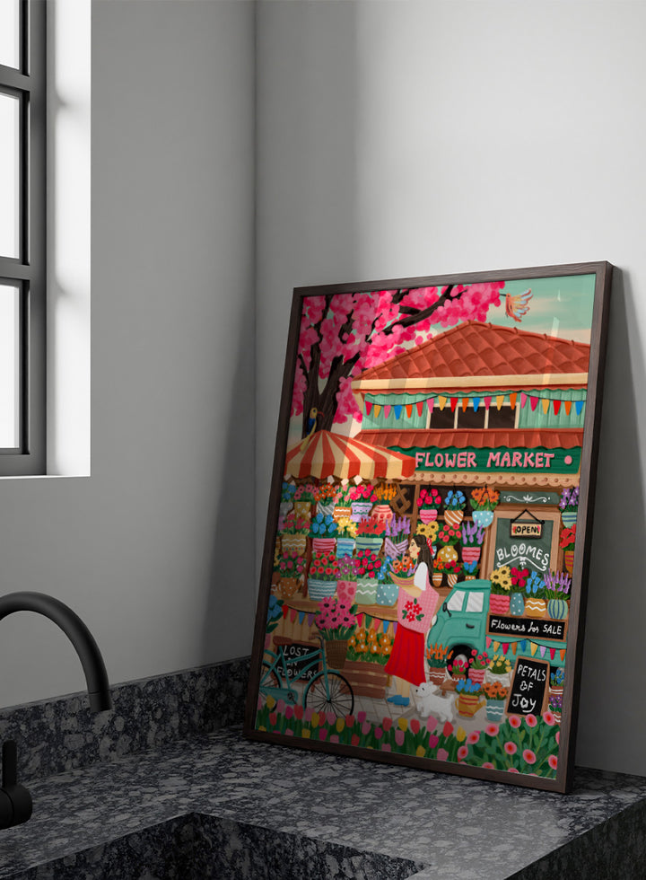 A colorful illustrated flower market scene with a shop front, blooming pink cherry blossoms, flower stalls, a woman standing by a bicycle, and signs reading &