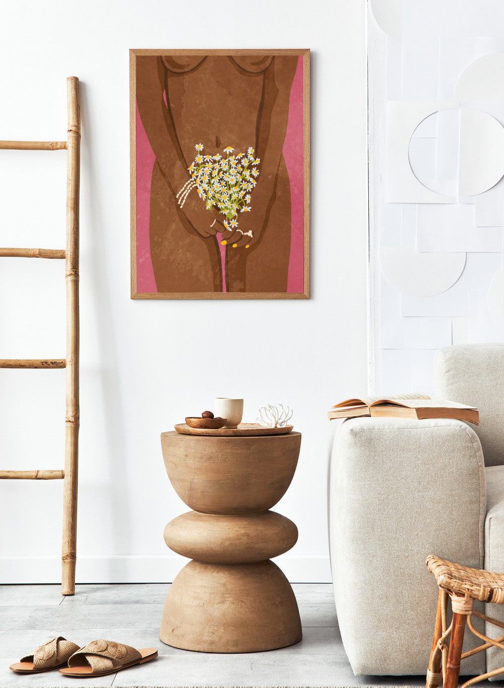 Illustration of a hand holding flowers against a brown background. Wearing Flowers by Raissa Oltmanns is a modern woman portrait art print with daisies, pink background, and minimalist graphic wall poster design.