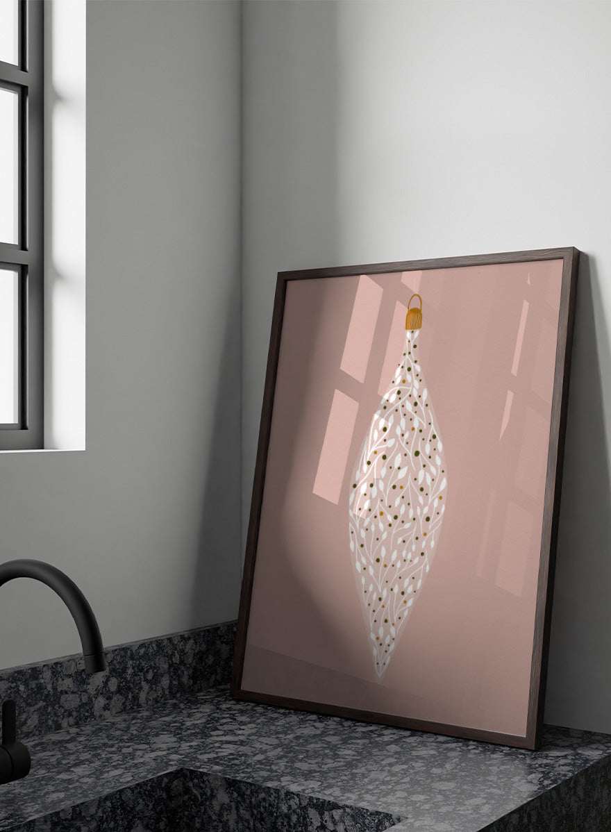 Shop Ornament On Pink by Katie O’Shea, a botanical Christmas wall art print poster featuring white leafy branches, green and gold details, and a dusty pink background.