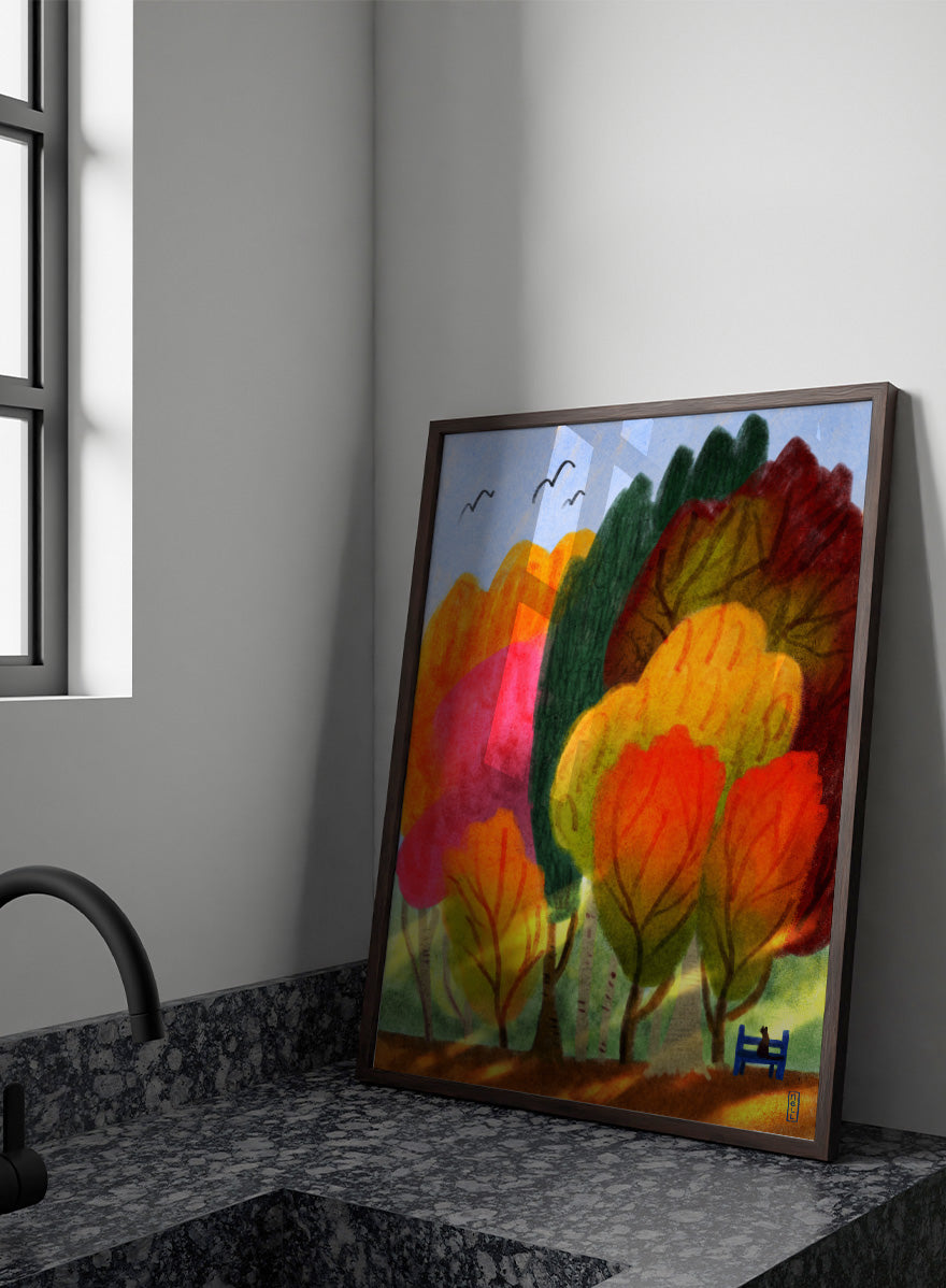 A colorful abstract landscape painting featuring stylized trees in shades of orange, yellow, red, green, and pink under a light blue sky with birds. Shop Cat On a Park Bench and Autumn Trees by Dirkie Nell, a colorful autumn landscape and animal art print featuring a black cat, park bench, and vivid fall trees.