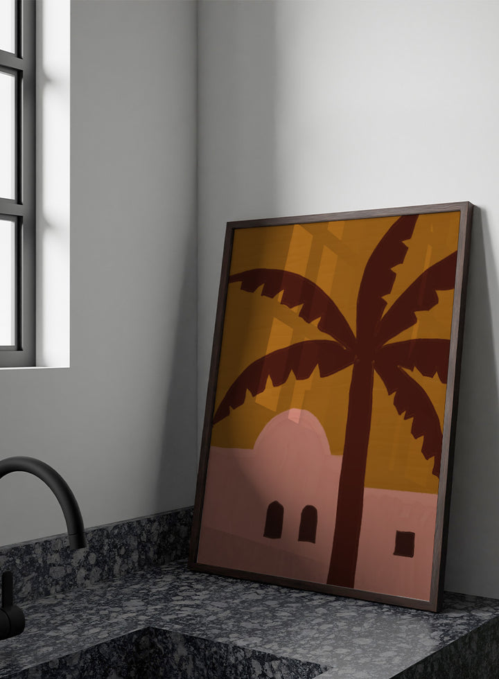 A stylized painting of a palm tree in front of a pink building under a mustard yellow sky. Desert Palm Abode by The Art Concept art print featuring a pink desert home, oversized palm tree, ochre sky, and warm retro color palette.