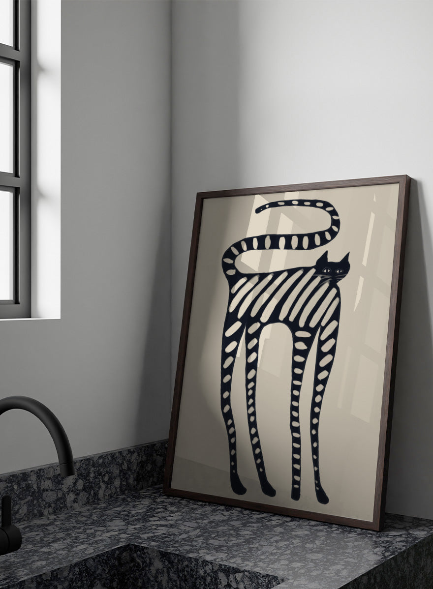 A stylized black cat illustration with bold diagonal stripes and white oval spots on a warm beige background. Striped Whimsical Cat by The Art Concept playful cat art print featuring an elongated black cat with cream stripes and an oversized looping tail.