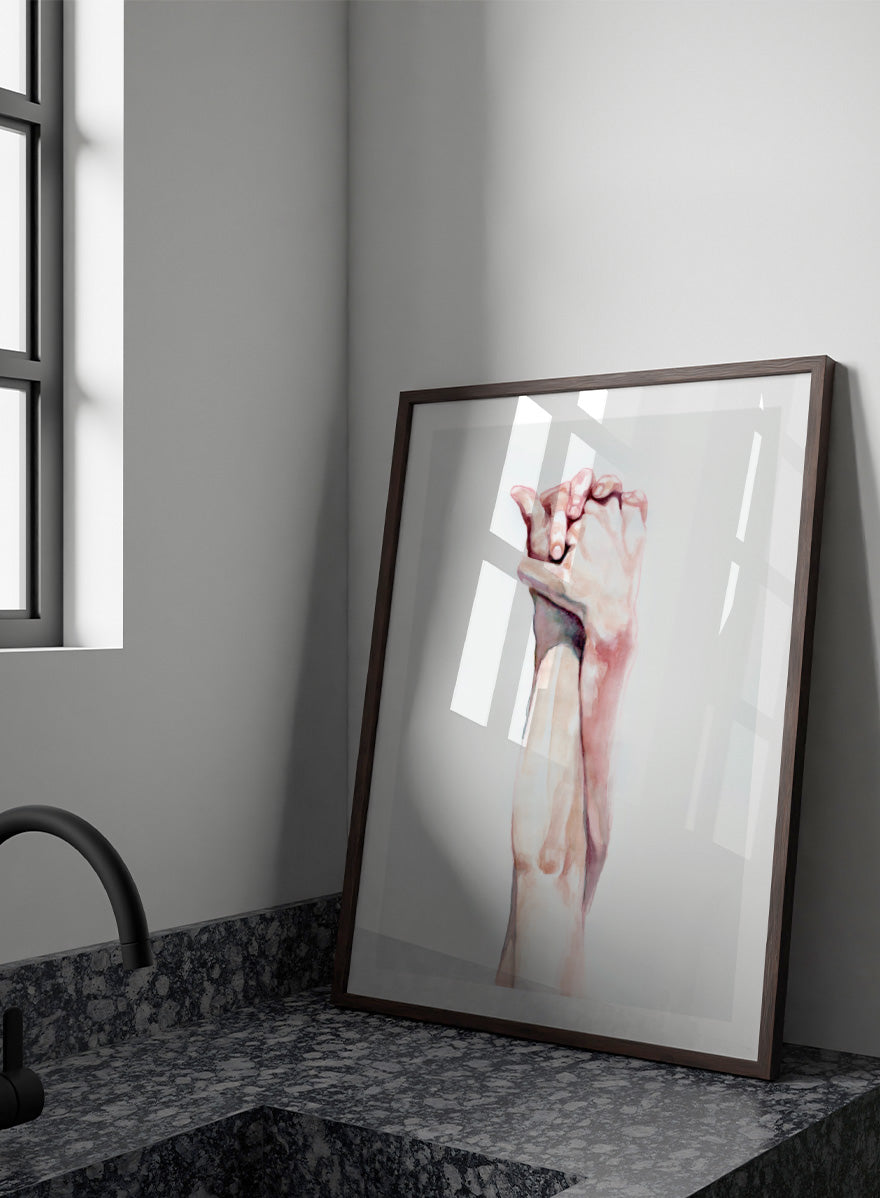 Shop Tender Hand Embrace by Sophia Novosel, a soft figurative wall art print poster featuring two hands intertwined in pink, peach, and cream watercolor tones.
