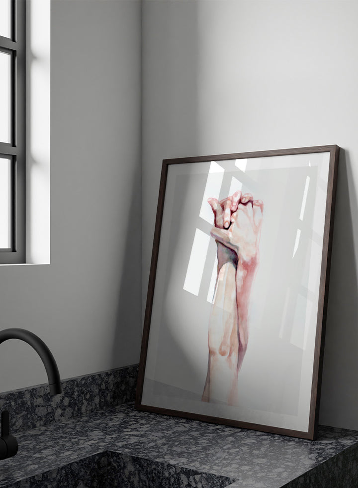 Shop Tender Hand Embrace by Sophia Novosel, a soft figurative wall art print poster featuring two hands intertwined in pink, peach, and cream watercolor tones.