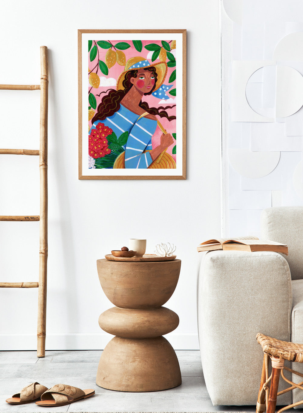 Colorful artwork of a woman with braided hair, wearing a straw hat and striped shirt, against a pink background with lemons and flowers. Lemon Tree Summer by Caroline Bonne Müller is a fine art print and wall poster of a woman under lemon branches with flowers in a bright modern aesthetic.