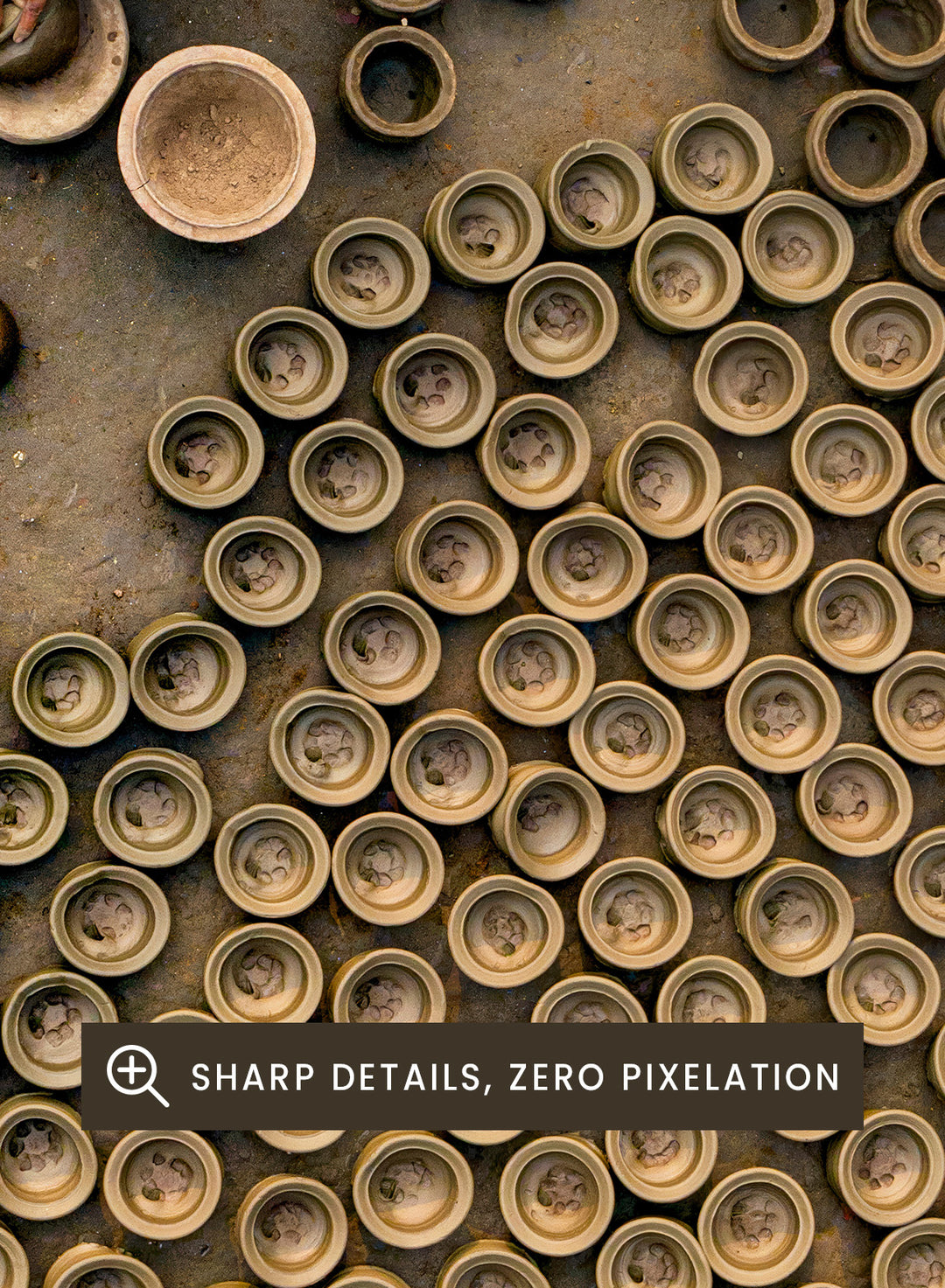 Person working with clay pots on a textured surface. Pot Making by Azim Khan Ronnie aerial photography print showing clay pots drying in Bangladesh village, traditional craft wall art poster
