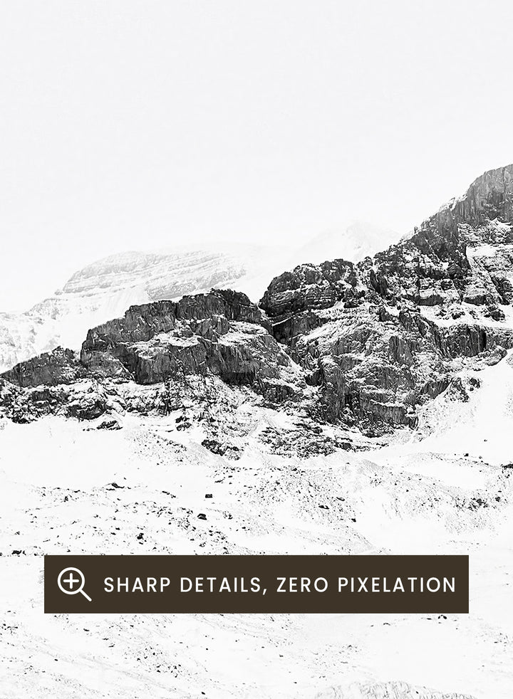 Black and white mountain landscape with 'Mountains Natura' text. Serene Peaks by The MIUUS Studio is a black and white mountain photography art print and wall poster featuring snowy peaks, minimalist composition, and modern neutral design.