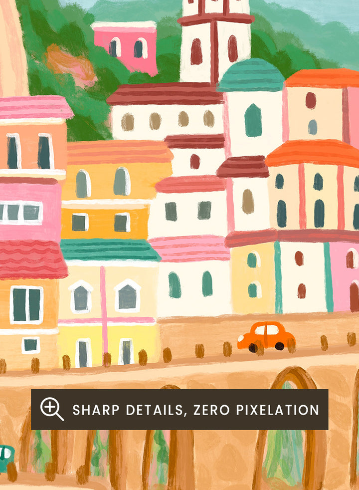 A colorful illustrated coastal town scene with pastel buildings, a stone bridge, blue water, mountains, flowers, and hanging yellow leaves. Shop Colorful Amalfi Coast by Nidhi Kachhadiya, a vibrant Italian coastal wall art print inspired by the Amalfi Coast, pastel villages, blue sea, and lemon trees.