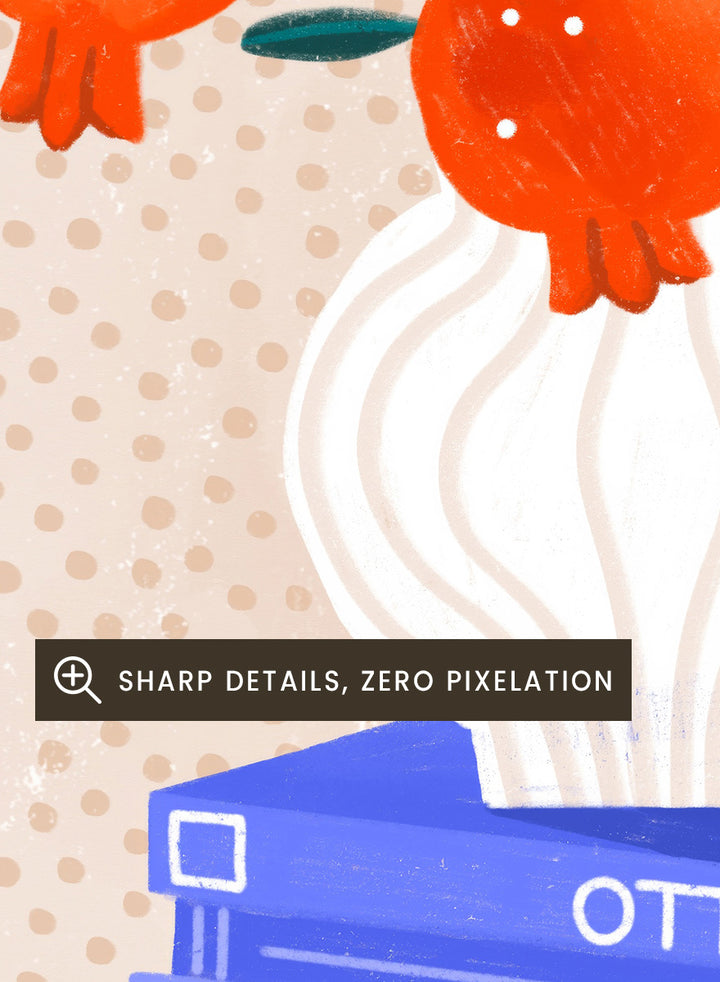 A framed art print featuring a stylized illustration of pomegranate branches in a white vase resting on a stack of books, set against a light beige dotted background. Cozy Tabletop Pomegranates by Bea Müller still life art print featuring red fruit branches, a sculptural vase, design books, and colorful interior styling.