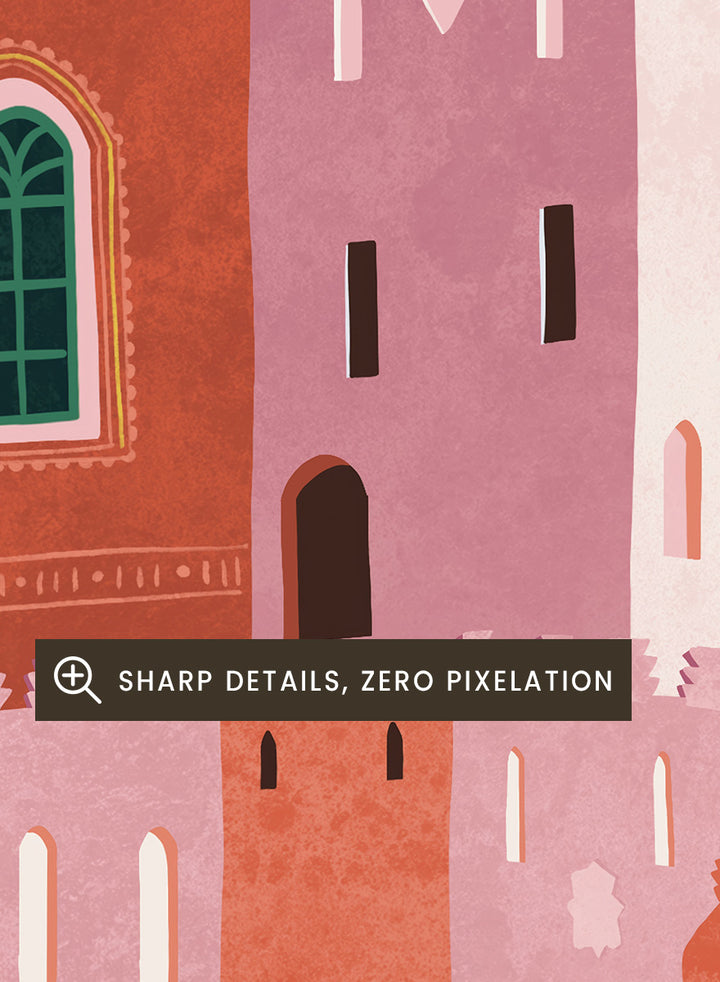 A framed art print featuring a stylized illustration of Moroccan-style buildings in shades of terracotta, pink, and cream, accented with green palm trees and blue window details, set against a light blue sky. Vibrant Moroccan City by Ceyda Alasar travel art print featuring layered terracotta architecture, arched windows, palms, and colorful Moroccan details.