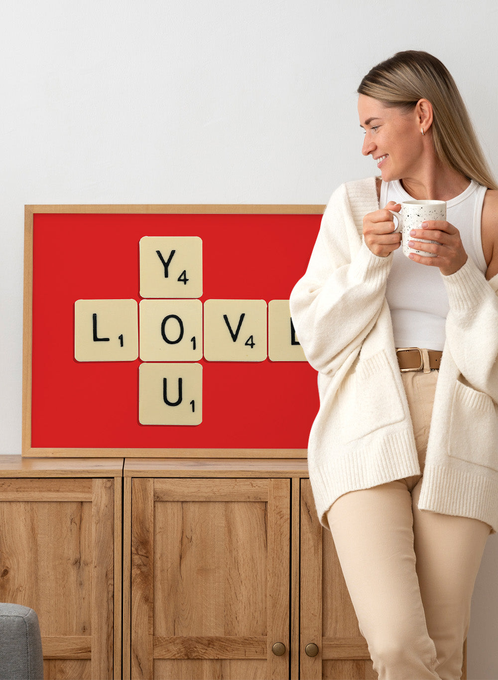 Scrabble tiles spelling LOVE YOU on a red background. Love You by Florent Bodart is a playful crossword-style art print featuring letter tiles spelling LOVE YOU on a red background. Retro typography wall poster with optional framing.
