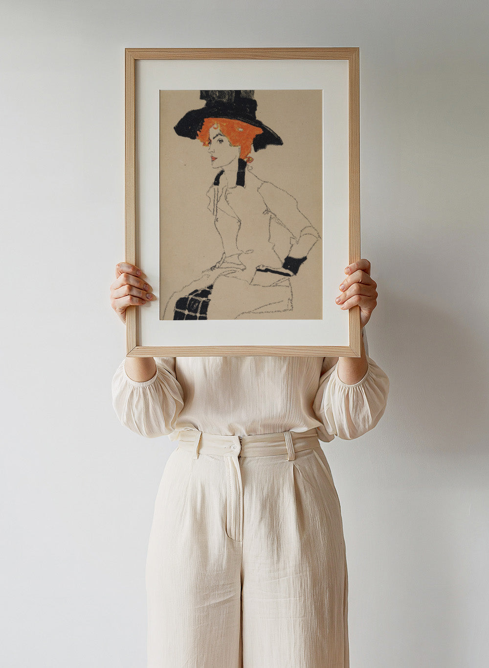 Featuring the original Egon Schiele's Artwork Portrait of a Woman 1910 painting, this vintage poster wall art print showcases the classic expressionist retro art. Schiele's paintings and drawings are distinguished by their contorted body forms and emotive lines, establishing the artist as an early pioneer of Expressionism.
