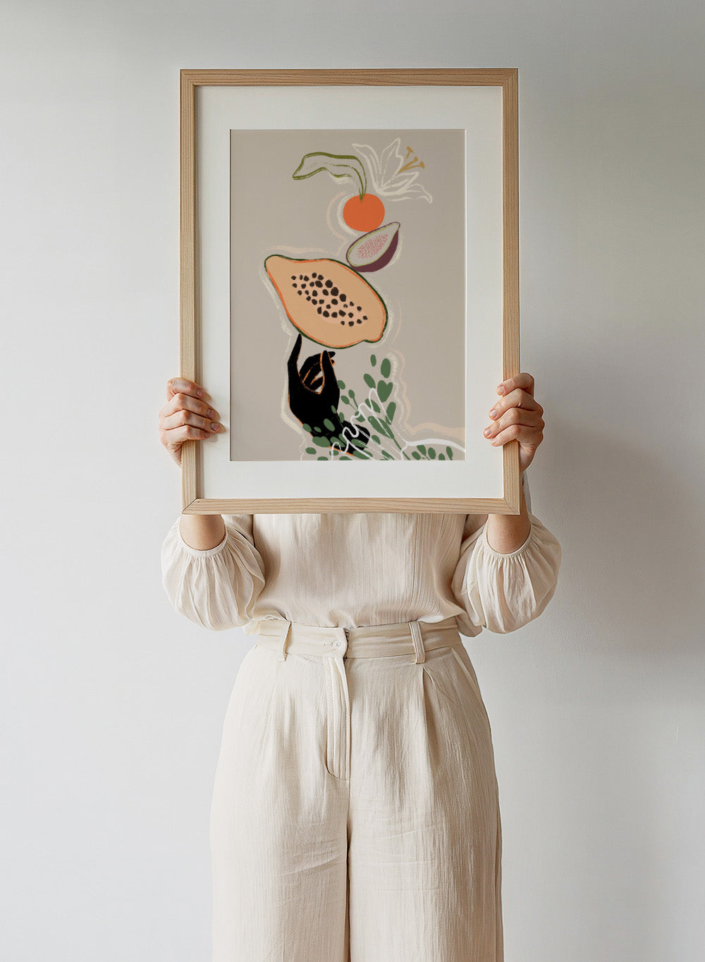 Illustration of a sloth holding a papaya with a beige background. Balancing Fruits by Arty Guava is a modern fruit still life art print with papaya and fig. Officially licensed wall poster for kitchen decor.
