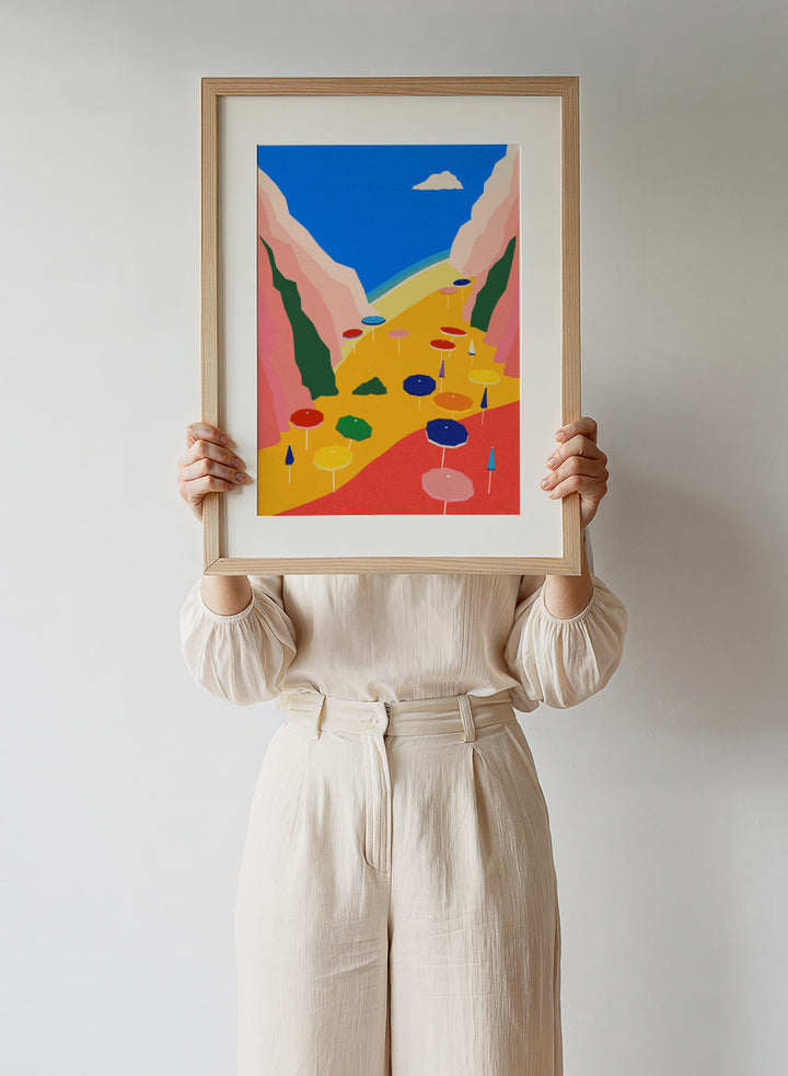 Colorful umbrellas on a red and yellow landscape with mountains and blue sky. Lido Liguria by Rosi Feist is a modern coastal art print with bold Mediterranean color, beach umbrellas, and minimalist Italian travel poster style.