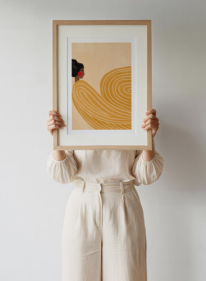 The Woman With the Yellow Stripes by Bea Müller is an officially licensed art print featuring flowing yellow lines and a warm modern portrait. Framed or unframed options available.