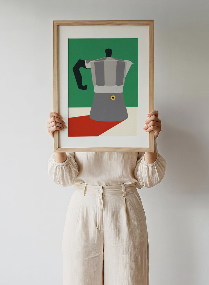 Stylized illustration of a Moka pot on a green, white, and red background. Stylized illustration of a Moka pot on a green, white, and red background. Espresso Italiano by Rosi Feist is a minimalist moka pot kitchen art print with Bauhaus-inspired color. Officially licensed modern poster with framing.