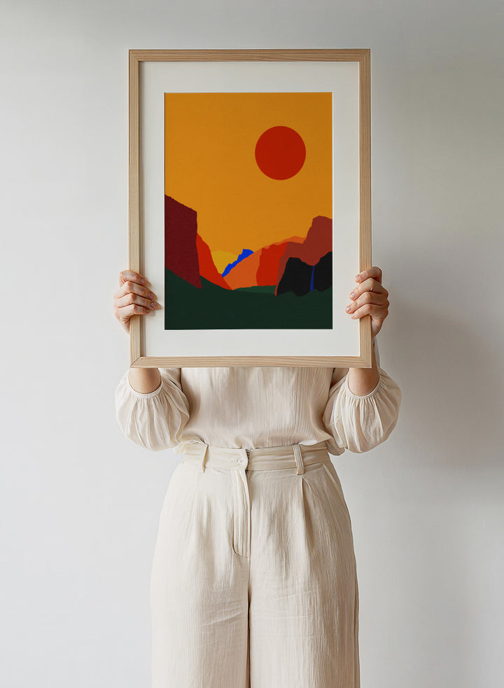 Simplified landscape with red sun, green ground, and brown cliffs. Yosemite Valley by Rosi Feist is a modern minimalist landscape fine art print featuring bold cliffs and a graphic sun. Officially licensed wall poster with optional artisan framing.