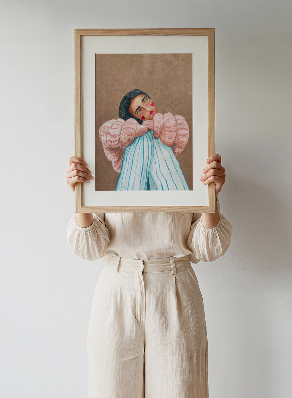 Artistic illustration of a person with large, textured sleeves against a brown background. Dreaming Girl by Raissa Oltmanns is a modern woman portrait art print with soft watercolor style, cozy pink jacket illustration, and contemporary wall poster.