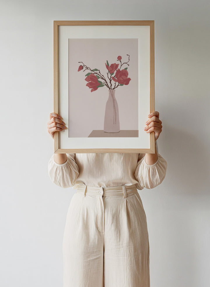 Vase with red flowers on a beige background. Vase by Flow Line is a modern still life art print featuring soft pink flowers in a ceramic vase. A warm, minimal wall poster from the It’s All Love collection.