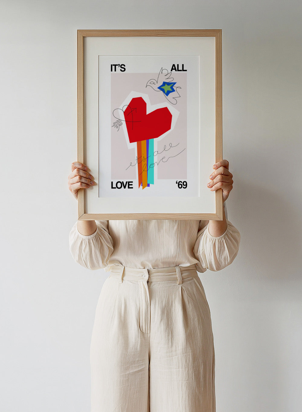 Colorful abstract design with a red heart and text on a light background. It’s All Love ’69 Heart Greige by Frances Collett is a colorful heart art print with rainbow stripes and expressive linework. Officially licensed contemporary wall poster with optional framing.