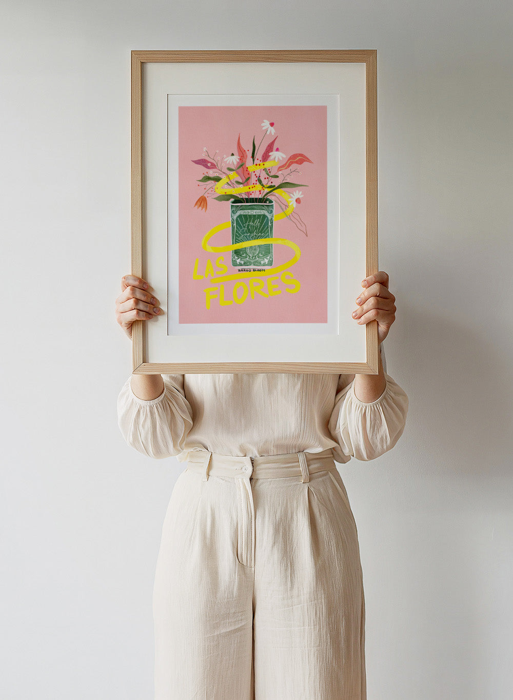 Illustration of a flower arrangement in a can with 'Las Flores' text on a pink background. Las Flores by Baroo Bloom is a colorful floral art print with playful illustration and bold lettering. Officially licensed wall poster with optional framing.