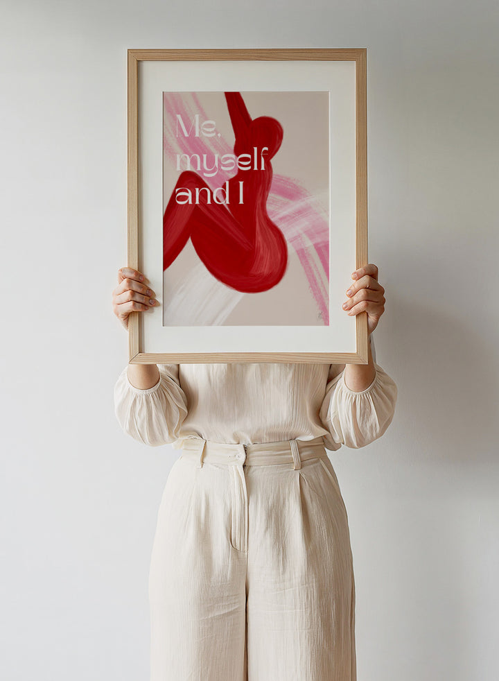 Abstract art with red shapes and 'Me, myself and I' text on a beige background. Red Woman by Anne-Marie Volfova is a modern figurative art print featuring bold red brushstrokes and empowering typography. Contemporary wall poster.