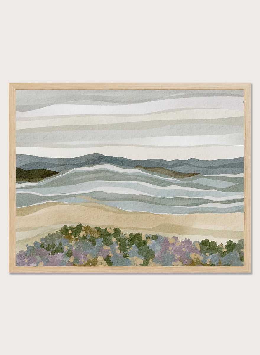 Shop Abstract Coastal Serenity by Nikita Jariwala, a modern coastal wall art print poster with layered waves, sandy shore, and soft blue, beige, green, and lavender tones.