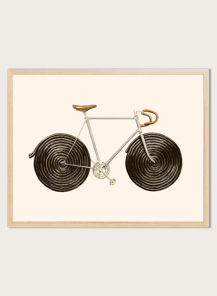 Framed artwork of a bicycle with spiral wheels on a beige background. Sweet Licorice Bicycle by Florent Bodart is a surreal bicycle art print with playful design and vintage style, a modern wall poster with creative and unique concept.
