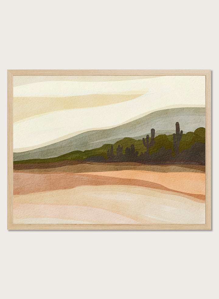 Shop Saguaro Desert Hills by Nikita Jariwala, a desert wall art print poster with saguaro cacti, layered hills, and warm sand, peach, olive, and cream tones.
