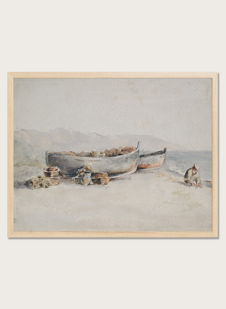 A framed watercolor painting of two small boats on a sandy shore. Fishing Boats on the Shore by Hercules Brabazon Brabazon is a vintage watercolor art print featuring fishing boats, nets, baskets, and a hazy coastal shore.