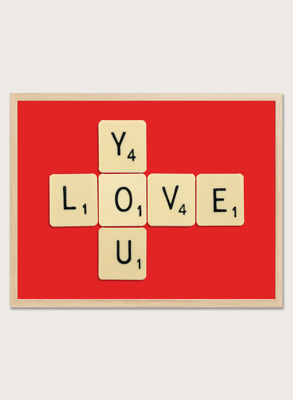 Scrabble tiles spelling LOVE YOU on a red background. Love You by Florent Bodart is a playful crossword-style art print featuring letter tiles spelling LOVE YOU on a red background. Retro typography wall poster with optional framing.