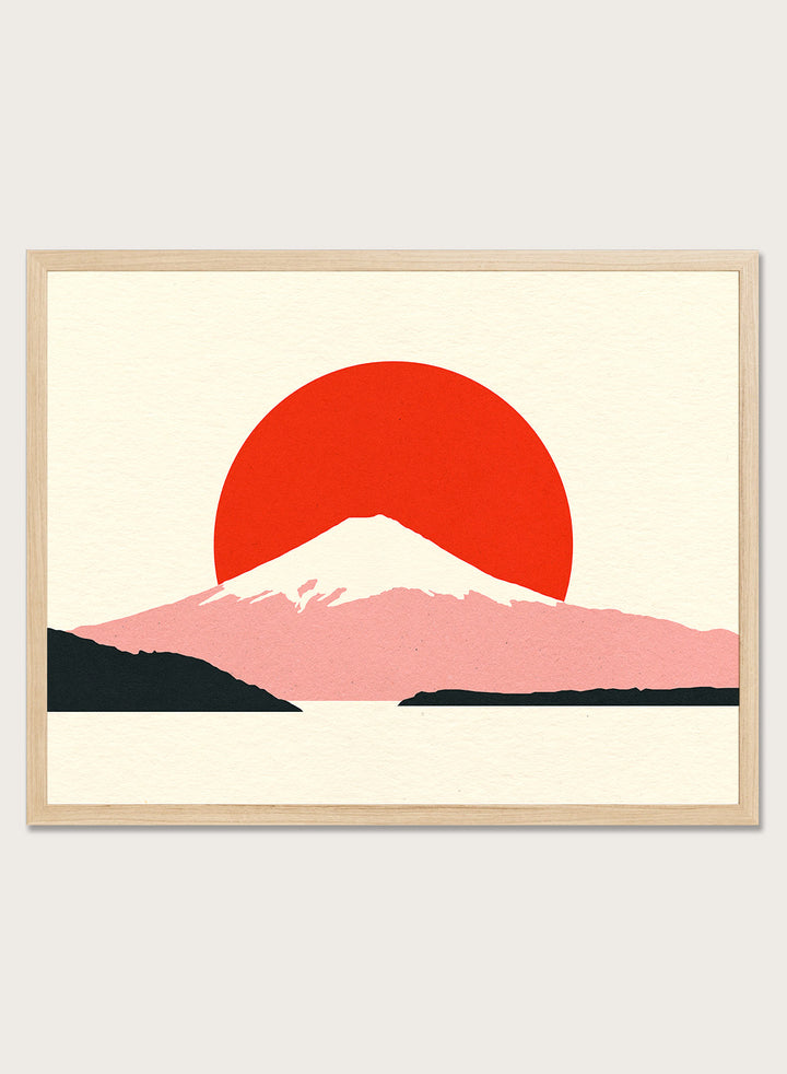 Framed artwork of a mountain with a red sun on a beige background. Fuji Sun by Rosi Feist is a modern Japanese landscape art print featuring Mount Fuji, a bold red sun, and minimalist contemporary poster design.
