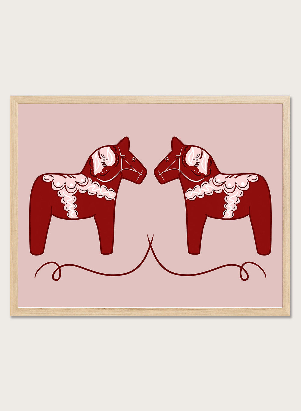 Two red Dala horse figures with white patterns on a pink background. Nordic Horses Twins by Athene Fritsch is a Scandinavian folk art illustration art print featuring Swedish Dala horses, bold red color, and modern wall art design.