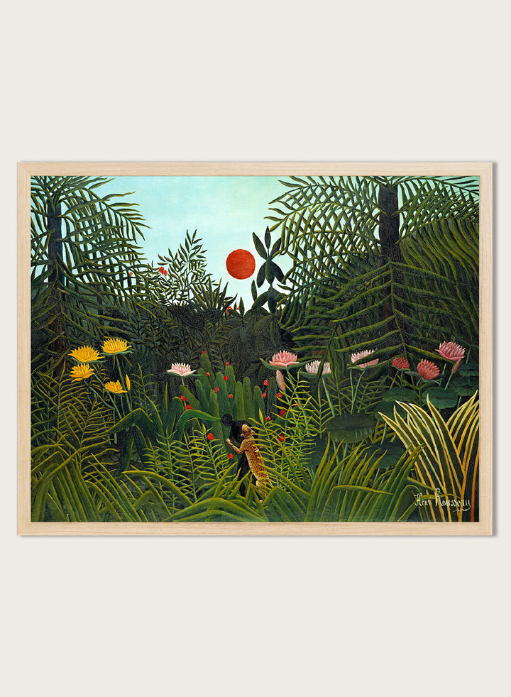 A framed art print depicting a lush, stylized jungle scene with dense green foliage, a small figure, and a bright red sun against a pale sky. Virgin Forest with Sunset by Henri Rousseau is a vintage jungle art print featuring lush tropical foliage, bright flowers, wildlife, and a red setting sun.