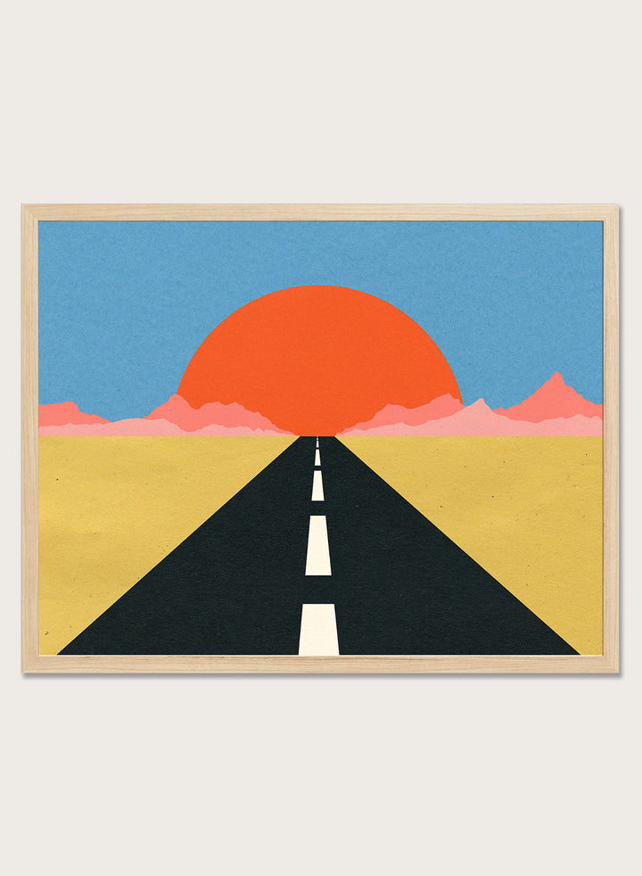 Simplified illustration of a road leading to a large red sun in a blue sky. Road To Sun by Rosi Feist is a modern landscape art print featuring a minimalist desert road, bold sunset colors, and contemporary graphic poster design.