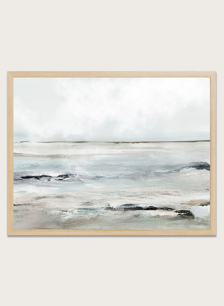 Shop Sandy Bay by Dan Hobday, a coastal landscape art print featuring soft blue-gray water, pale sky, textured shoreline, and layered neutral brushwork.