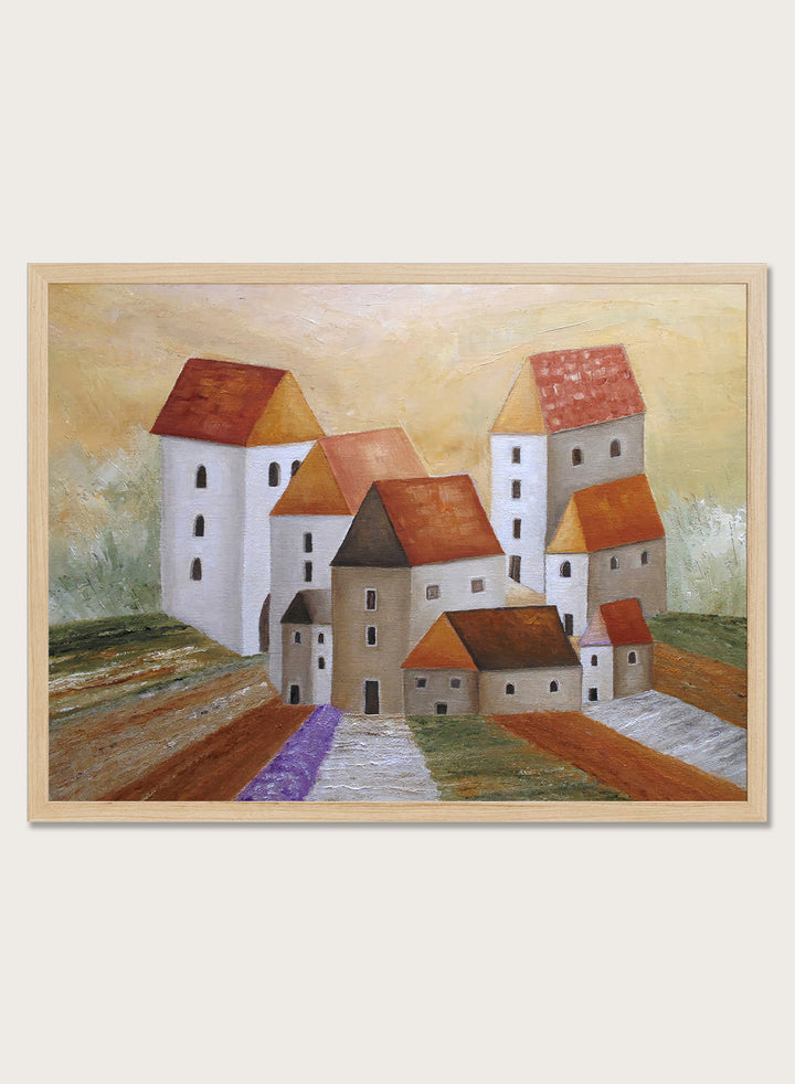 A framed landscape painting depicting stylized white buildings with orange-brown roofs, set in a field with a purple path under a warm yellow sky. Shop Peaceful Lavender Village by Angeles M. Pomata, an autumn village landscape art print featuring white houses, terracotta roofs, lavender fields, and warm earthy tones.