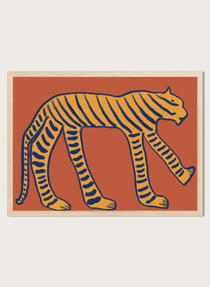 Bold Tiger Stride by The Art Concept animal art print featuring an ochre tiger with deep blue stripes on a warm rust background.