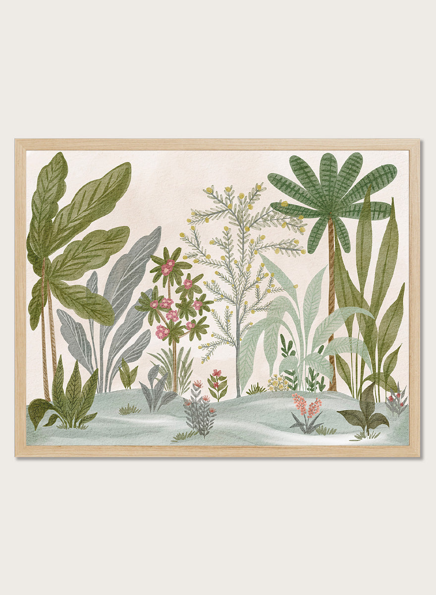 A framed botanical art print featuring a collection of tropical and jungle plants in muted green, gray, and soft pink tones on a cream background. Shop Lush Tropical Jungle by Nikita Jariwala, a tropical botanical wall art print poster with jungle plants, palm leaves, layered foliage, and green tones.