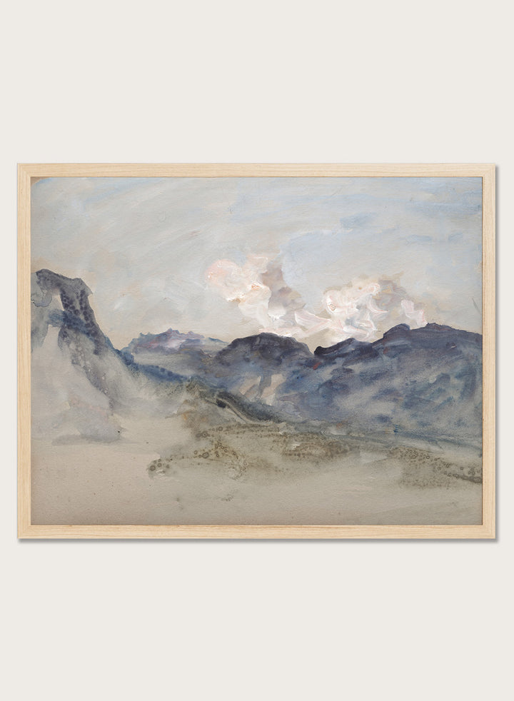 A framed landscape painting featuring blue and gray mountains under a pale sky with soft white clouds. In the Alps by Hercules Brabazon Brabazon is a vintage watercolor art print featuring snowy peaks, blue-grey mountains, soft clouds, and a misty alpine view.