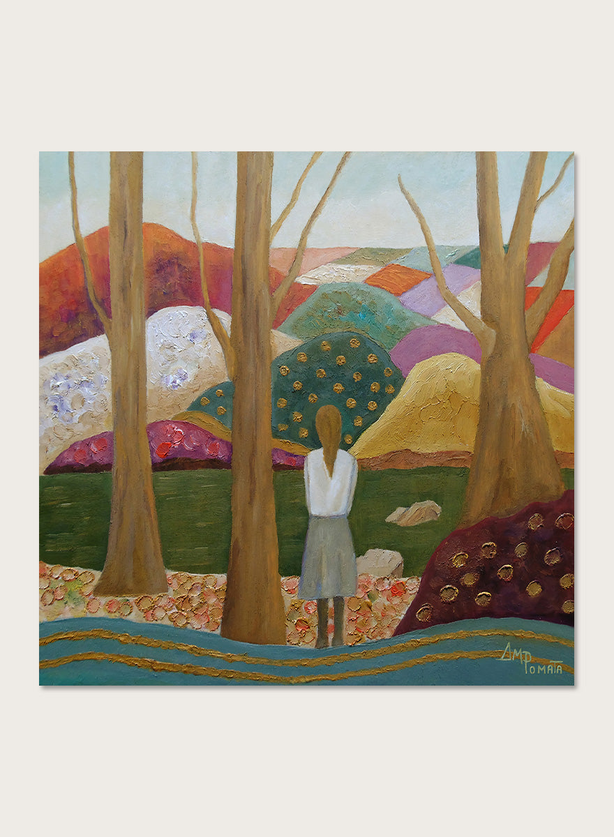 A framed landscape painting featuring a woman standing among tall trees, looking over a patchwork field of hills in earthy tones of green, purple, orange, and beige. Shop Woman Among Vibrant Hills by Angeles M. Pomata, a colorful landscape and portrait art print featuring a woman, rolling hills, trees, and earthy tones.