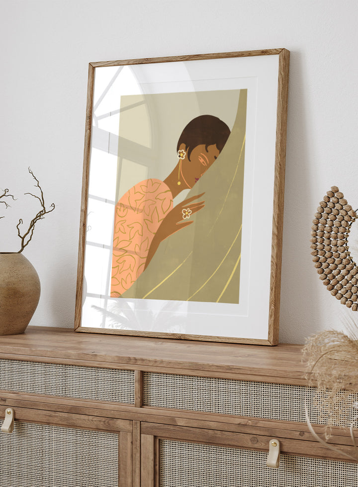 Illustration of a woman wrapped in a floral-patterned shawl with a neutral background. The Introvert by Arty Guava is a modern portrait illustration featuring a woman figure, soft color palette, contemporary wall art style, and officially licensed artwork.