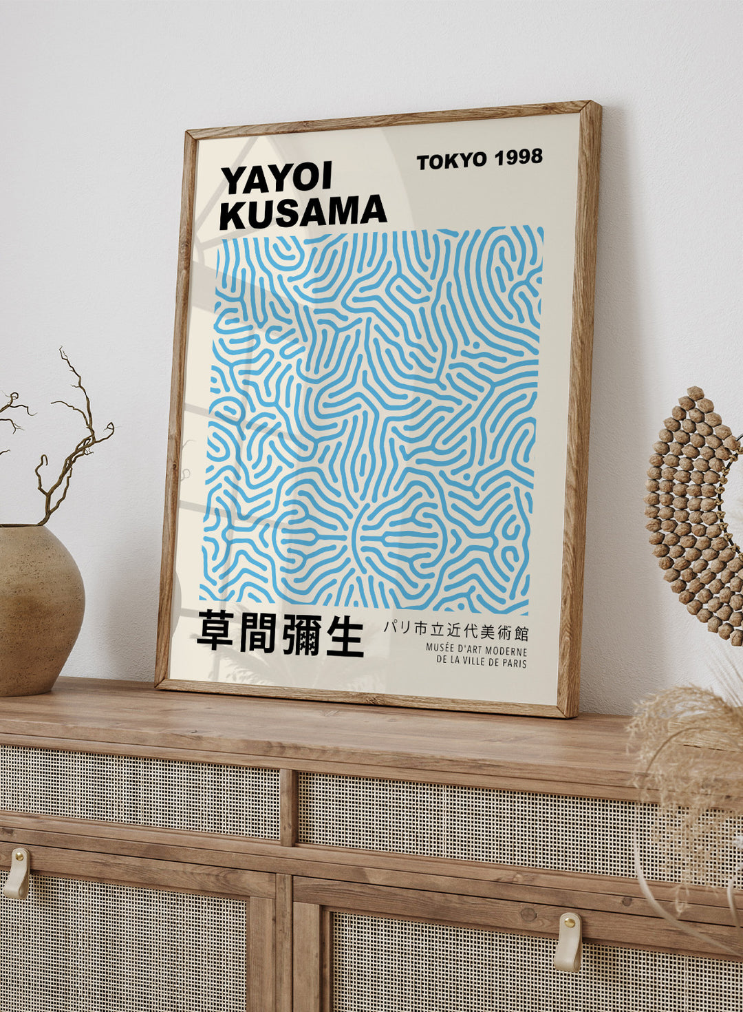 Inspired by Yayoi Kusama 草間彌生 Polka Dot Art, this exhibition Japanese poster art print showcases illustration of blue geometric lines against beige background. Featuring abstract geometric infinity web art, this Japani vintage exhibition poster by Yayoi Kusama is perfect for any boho, retro, minimalist, or Japani space.