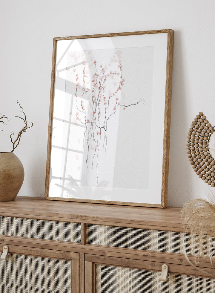 Art print of cherry blossom branches with pink flowers on a white background. Blooming Spring by Ankie Kooi art print featuring delicate pink blossoms, thin branches, watercolor florals, minimalist botanical illustration, soft nature wall poster.