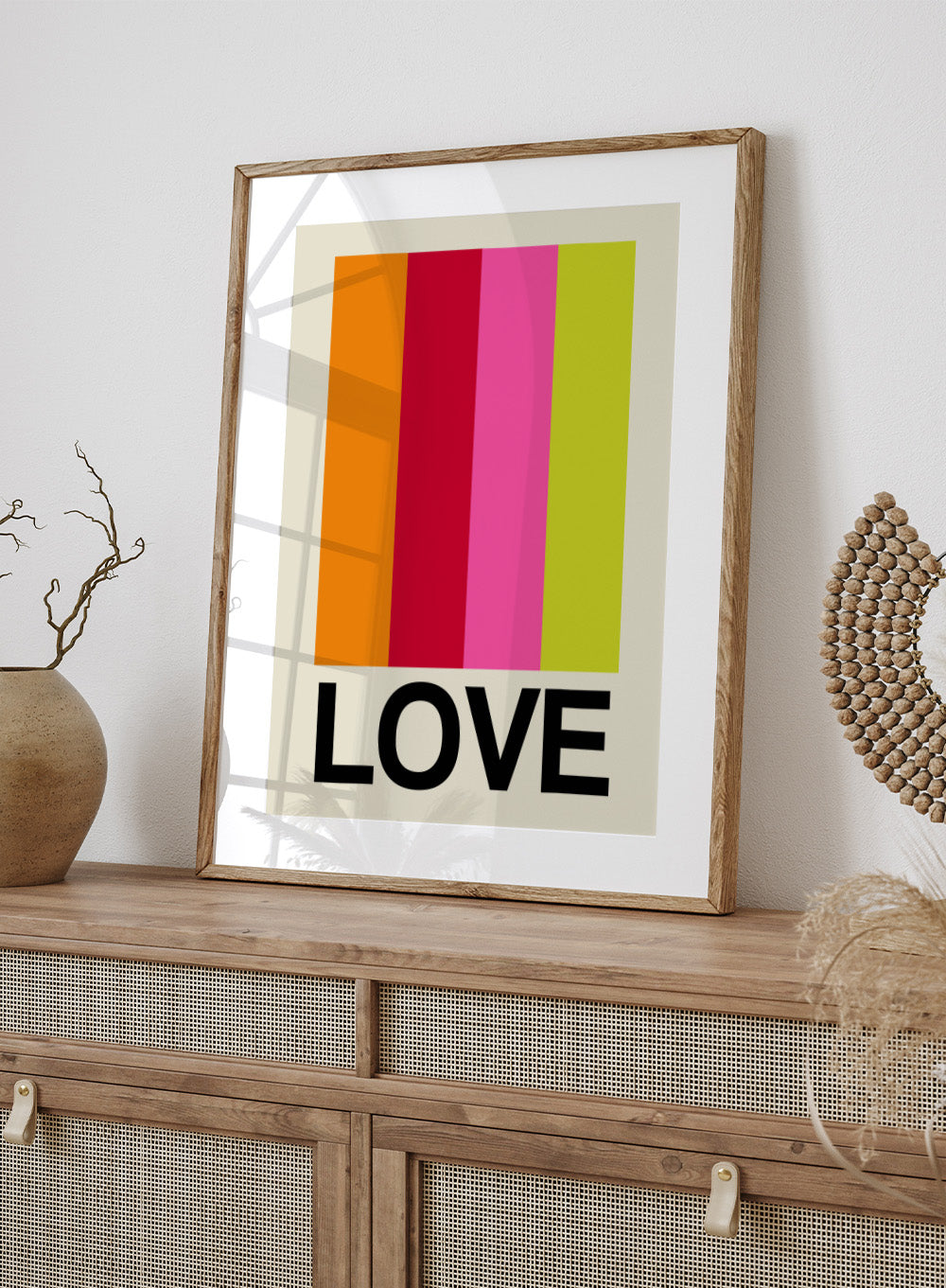 Colorful striped poster with the word 'LOVE' on a beige background. Retro Stripe LOVE Fruit by Frances Collett features colorful vertical stripes and bold LOVE typography. Officially licensed modern graphic art print with optional framing.